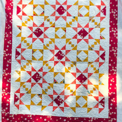 Mosaic Mystery quilt, by Lucy Blum