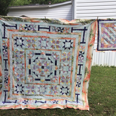 Grew to 76” square plus dolly quilt.