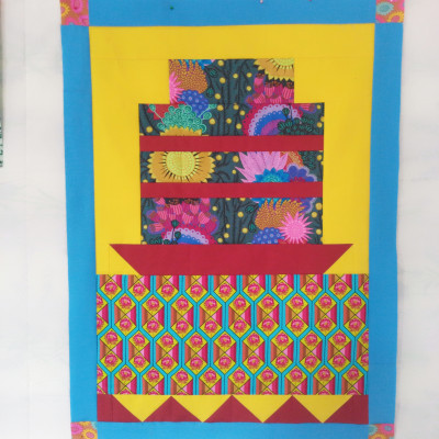 Working on birthday cake mini quilt