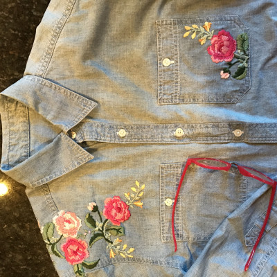 I used the Handpicked Bouquet Stamp Set by Altenew. Stamped directly on an old t