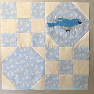 June Block with hand embroidered Mountain Bluebird.  Robin Siler