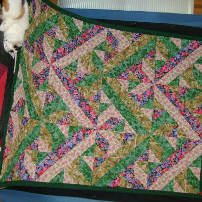 finished quilt, liked desgin so much that I made two more, green with flowers qu