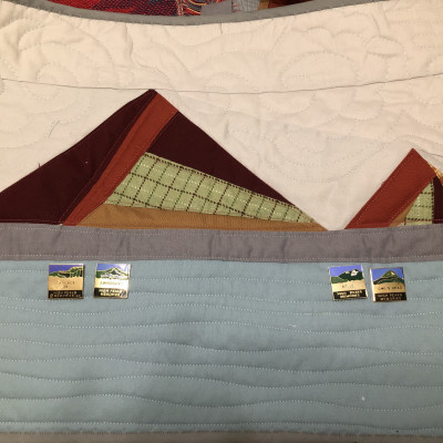 Adirondack banners to display the pins and badges for the peaks the grandchildre