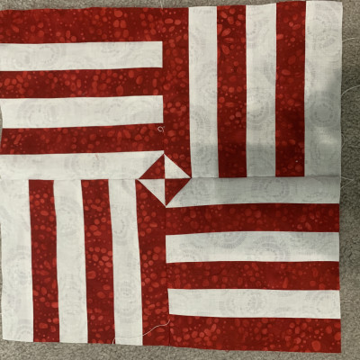 Barb SK. I like the hour glass in the center.