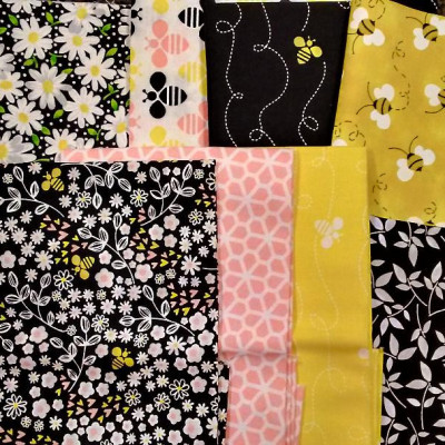 Bee theme, yellows, blacks, soft peach
