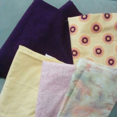 Background is Dark Purple (Aubergine), Border is Mediallion on Yellow.  Fabrics